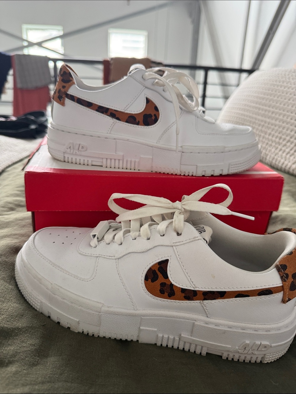 Nike White Low-Top Sneakers with Leopard Swoosh